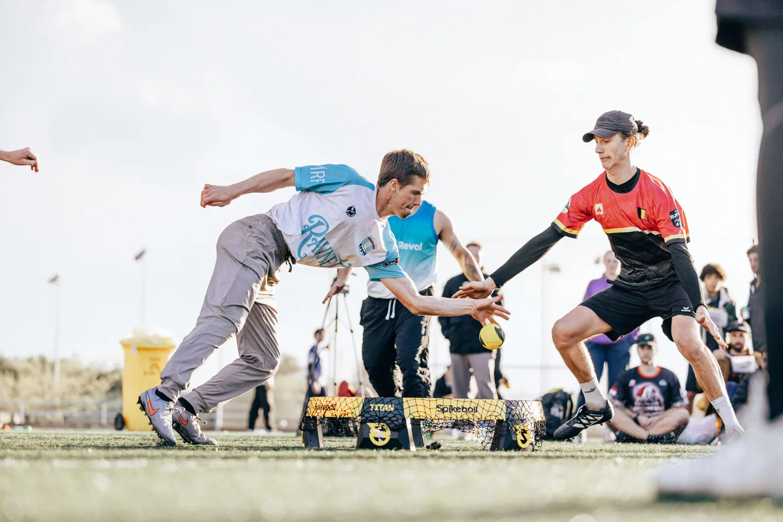 One of the Paes brothers in a red Belgium shirt defends against an American opponent at the Mallorca Open, March 2026
